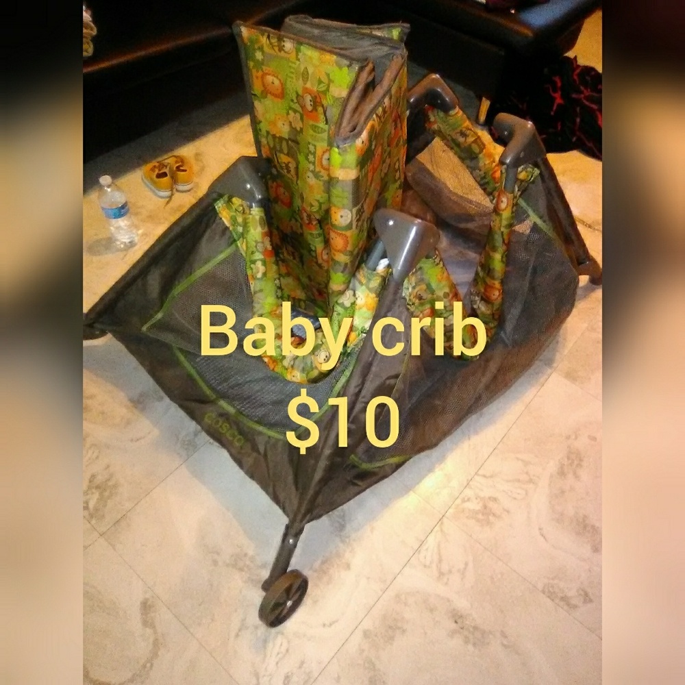 Baby crib,gold sandals,lil boy clothes,wall plaque